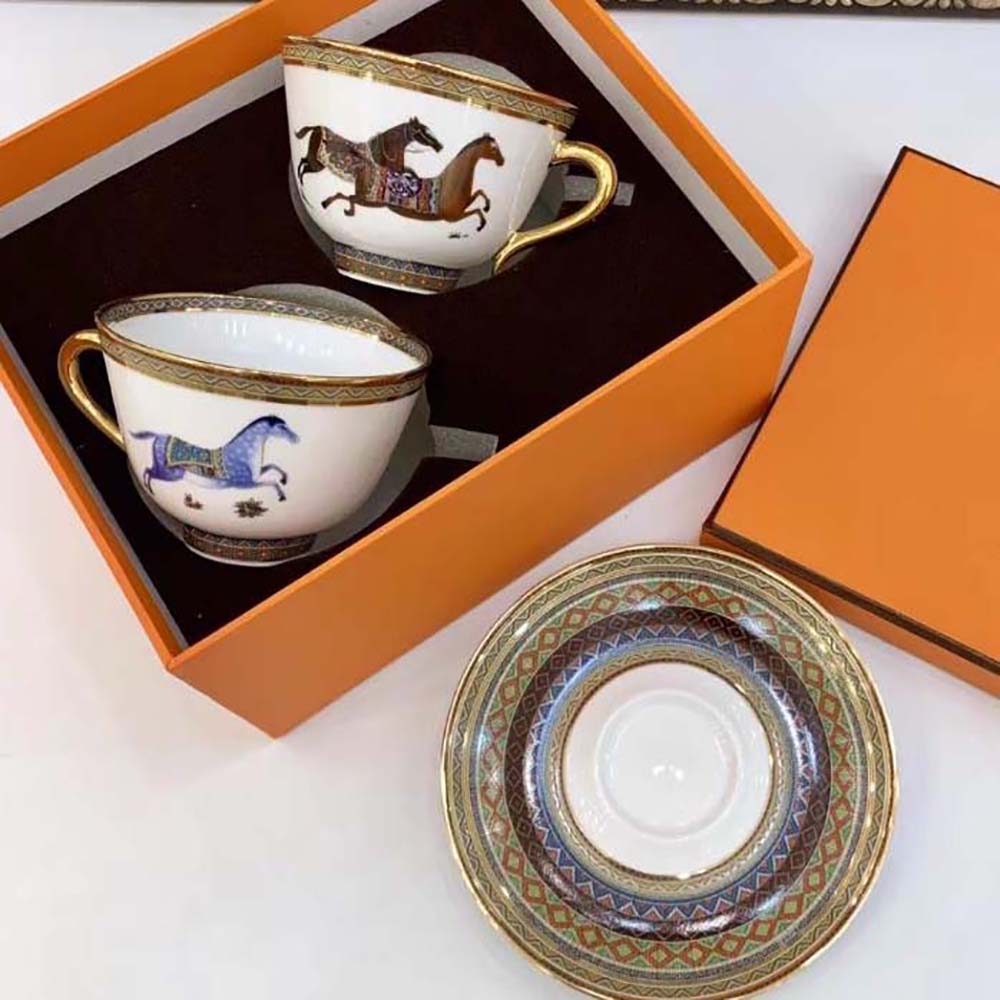 Close-up of the brown Cheval D’Orient motif on Hermes tea cup