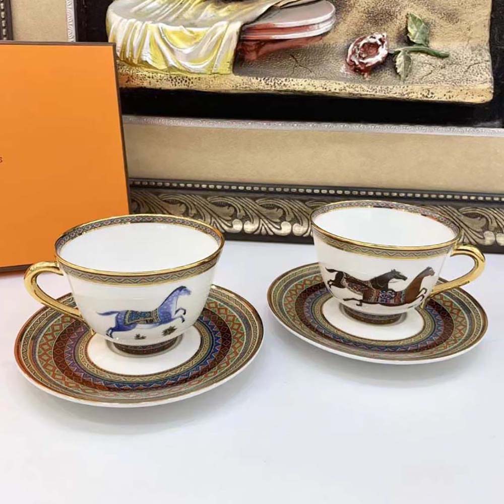 Side angle of Hermes Unisex Cheval D’Orient Tea Cup paired with saucer