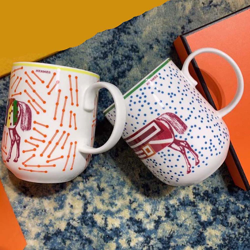 Side angle showing handle design of Hermes Unisex Hermes Hippomobile Set of 2 Mugs