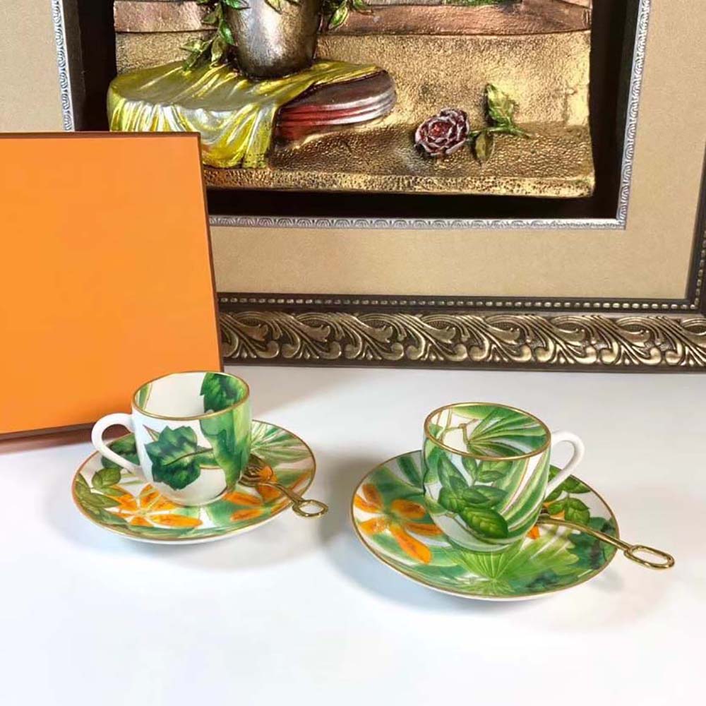 Side view of Hermes Unisex Passifolia Coffee Cup resting on saucer