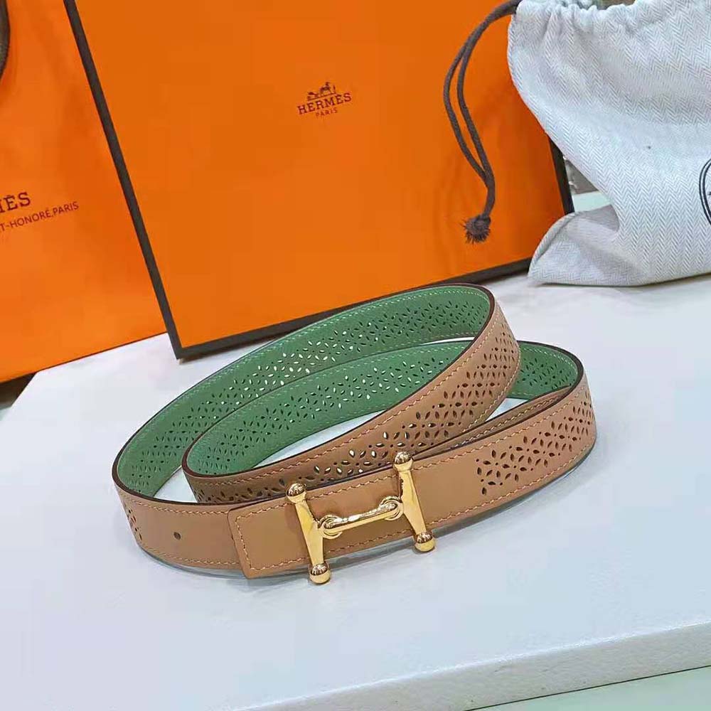 Side angle showing texture detail of green leather strap on Hermes belt