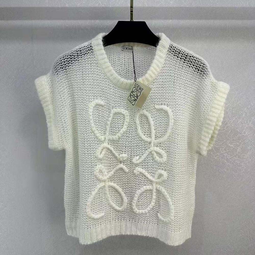 Close-up of Loewe Anagram embroidery detail on white mohair vest