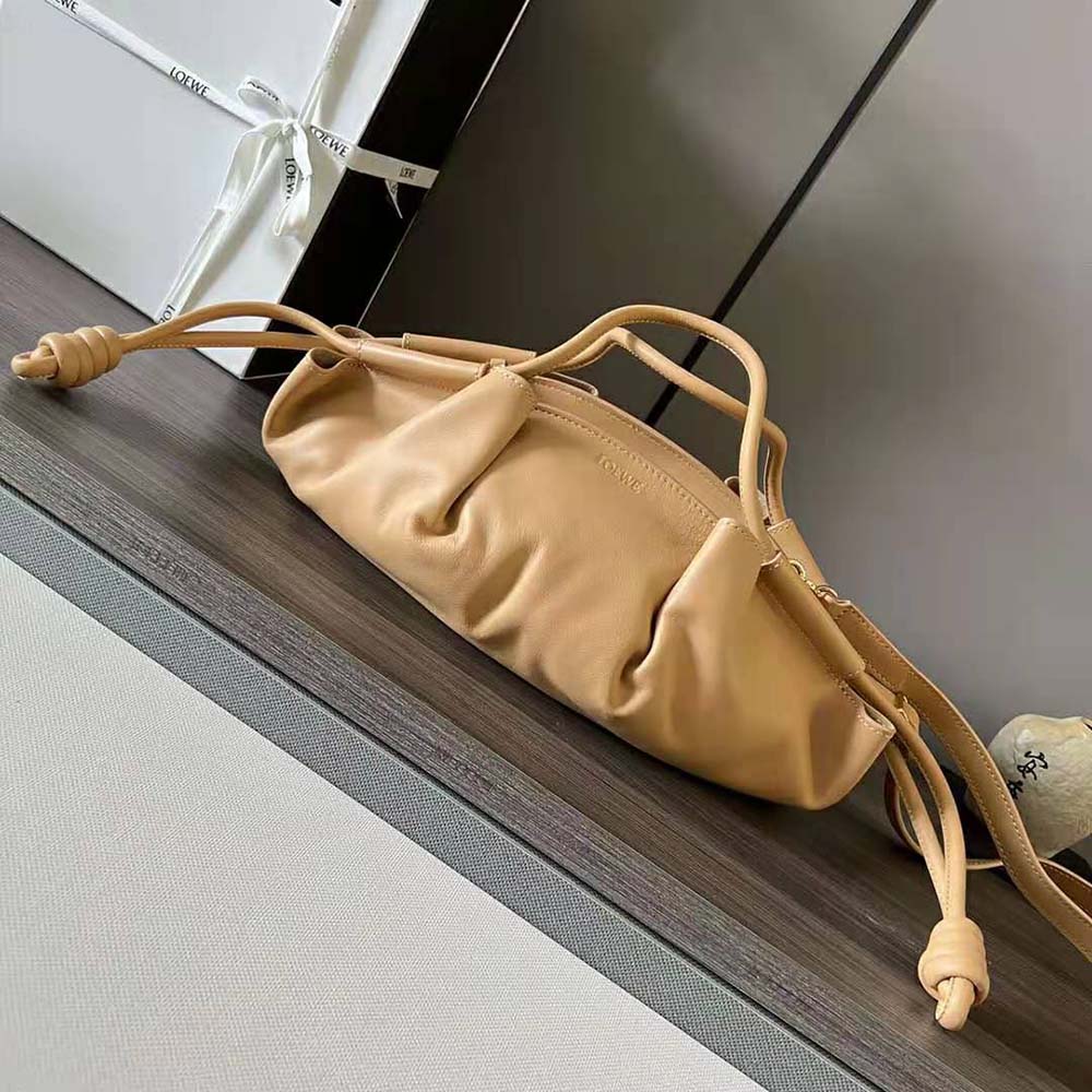 Close-up of gold-tone hardware on Loewe Women Small Paseo Bag Orange