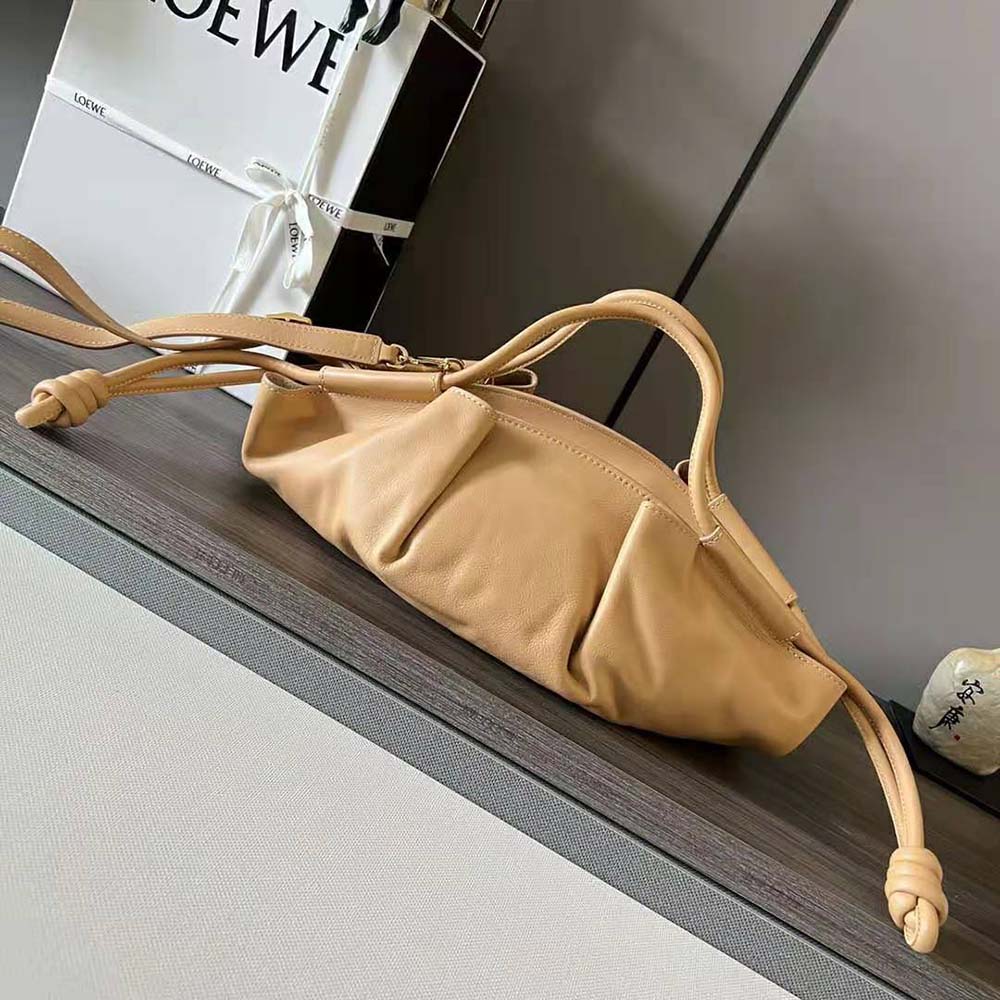 Side profile showcasing silhouette of Loewe Women Small Paseo Bag Orange