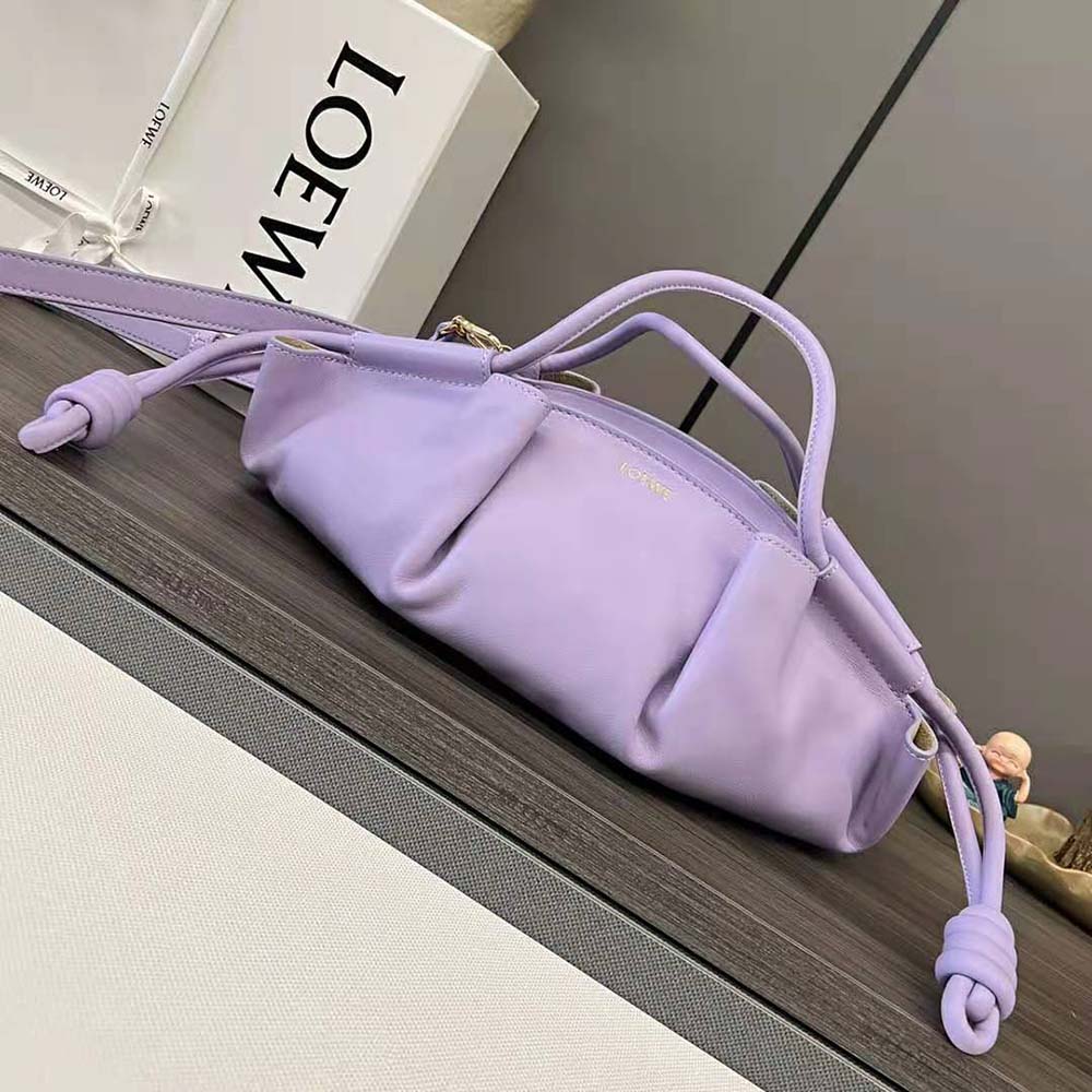 Close-up of shiny purple leather and silver hardware on Loewe Small Paseo Bag