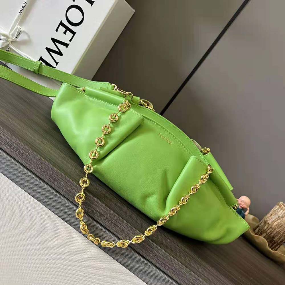 Side angle showing compact silhouette of Loewe Women Small Paseo Bag green