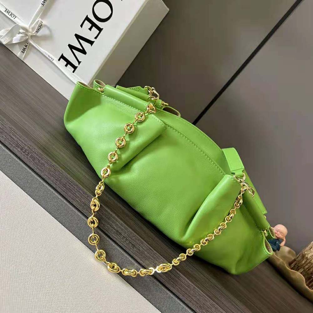 Close-up on gold chain strap detail of Loewe Women Small Paseo Bag