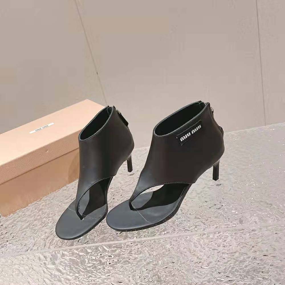 Front angle of Miu Miu Women Leather Thong Booties-Black open toe