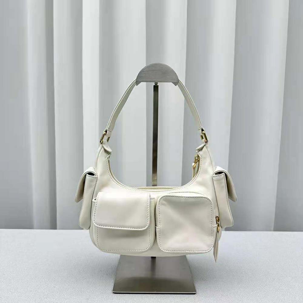 Side angle showing adjustable strap and silhouette of Miu Miu Women Nappa Leather Pocket Bag-White