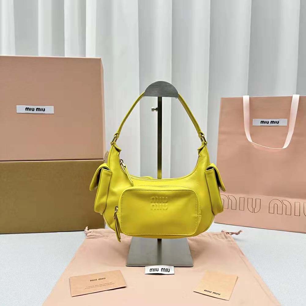 Side angle showing compact silhouette of Miu Miu Women Nappa Leather Pocket Bag-Yellow