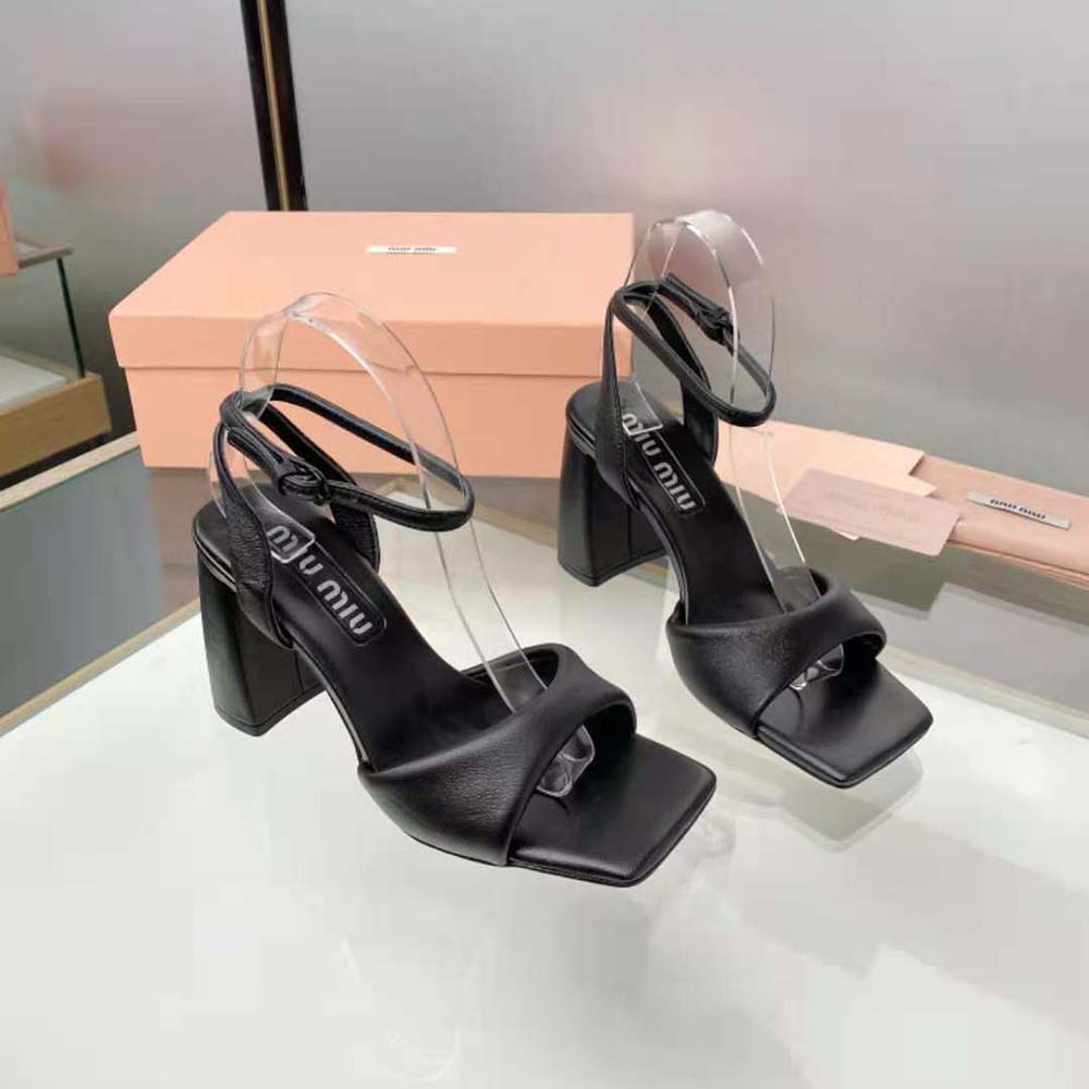 Close-up of padded leather and silver buckle on Miu Miu sandals