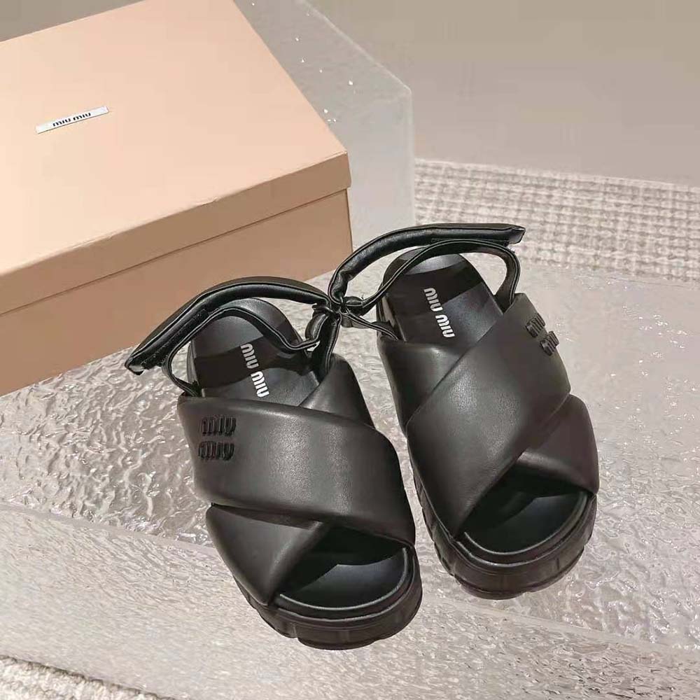 Close-up of silver buckle on Miu Miu Women Sporty Nappa Leather Sandals-Black