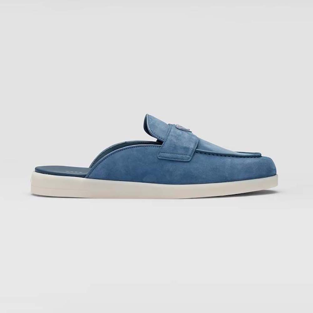 Side view of Prada Men Suede Sabots with the Enameled Metal Triangle Logo in blue