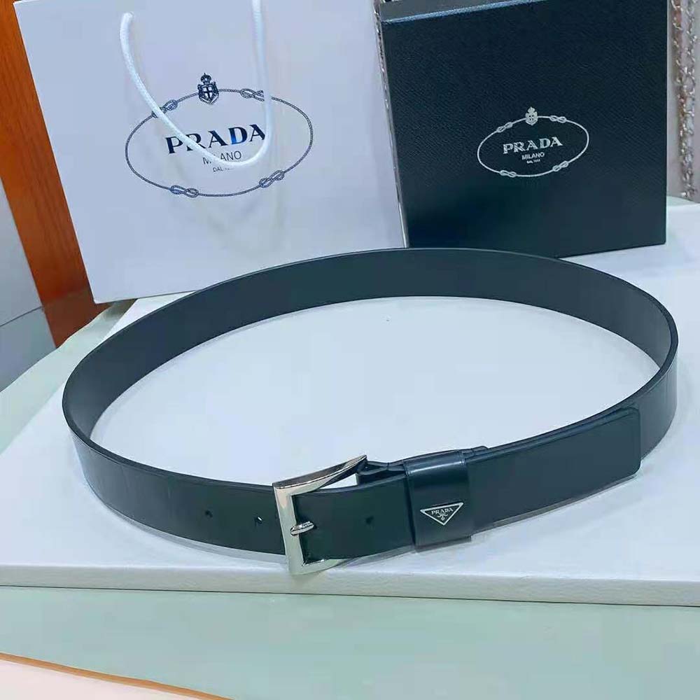 Close-up on enameled metal triangle logo of Prada Women Brushed Leather Belt
