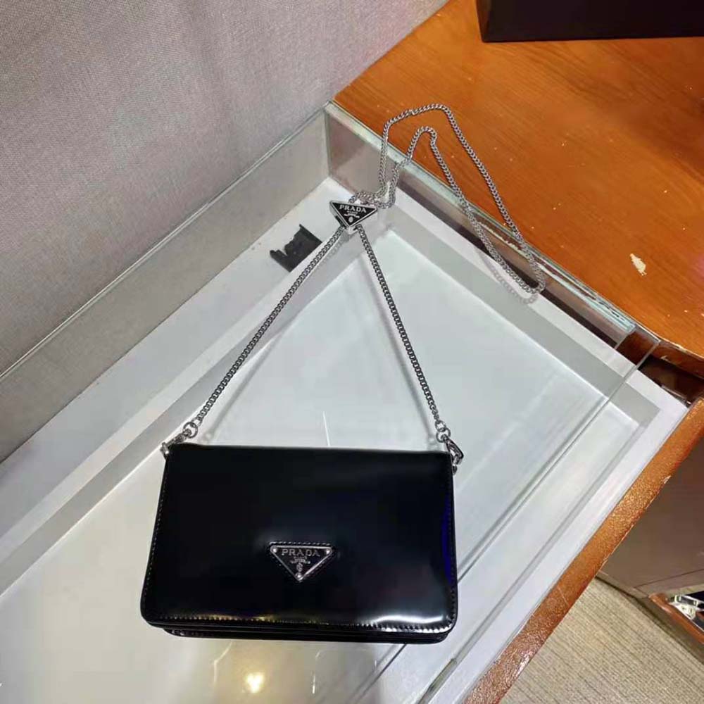 Side angle showing silhouette and adjustable strap of Prada Shoulder Bag Black