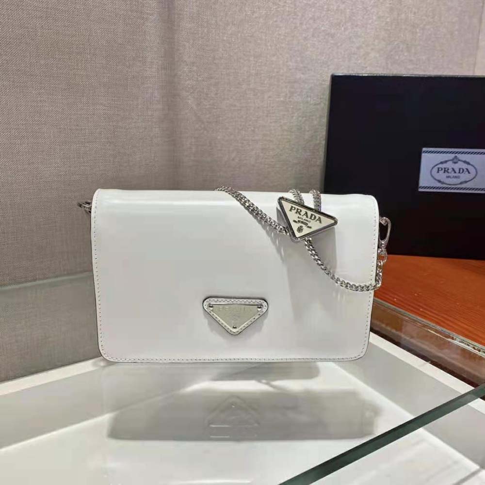 Side profile showing adjustable strap of Prada Women Brushed Leather Shoulder Bag-White