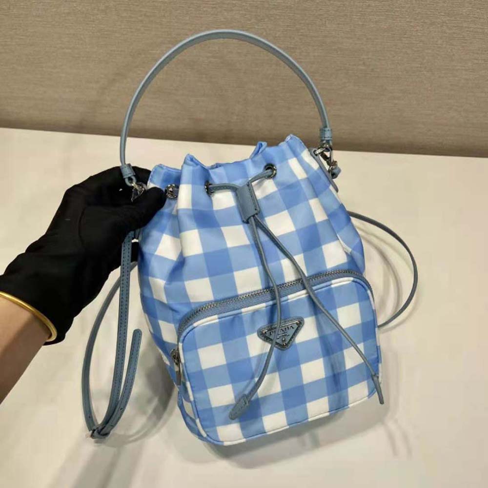 Side angle showing adjustable strap on Prada Women Duet Printed Re-Nylon Bag-Blue