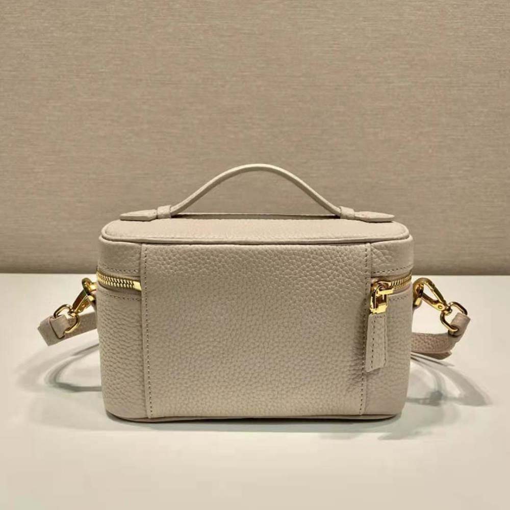 Side angle showing slim silhouette of Prada Women Leather Mini-Bag-Sandy