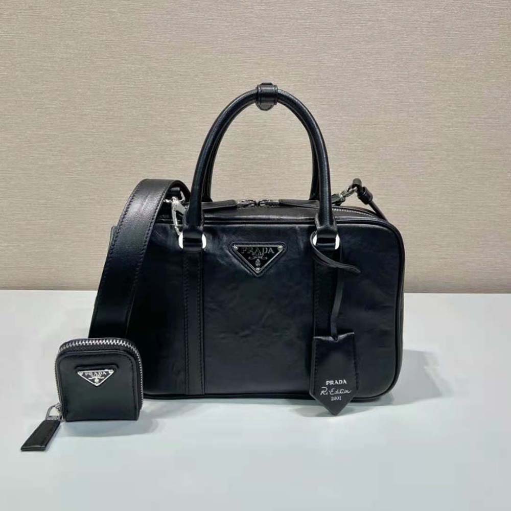 Close-up detail of polished silver hardware on Prada Medium Antique Leather Bag