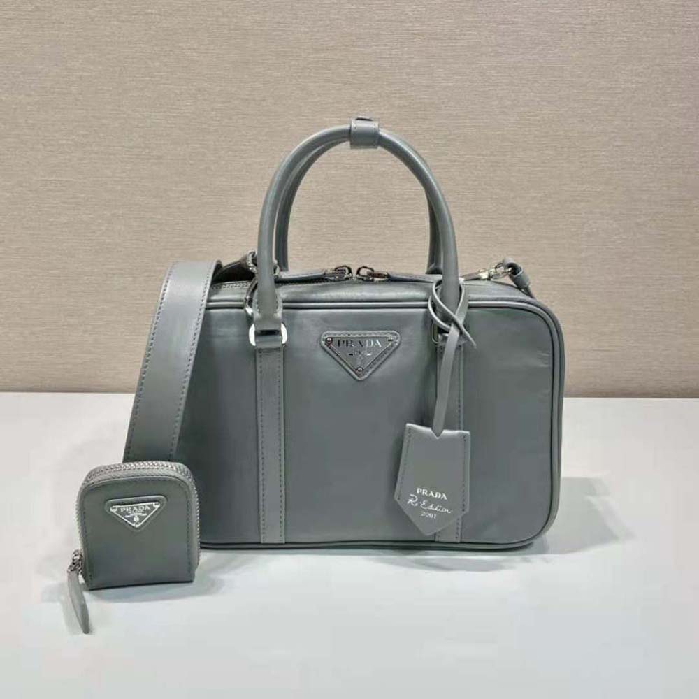Close-up of gold-tone hardware on Prada Women Medium Antique Nappa Leather Top Handle Bag-Gray