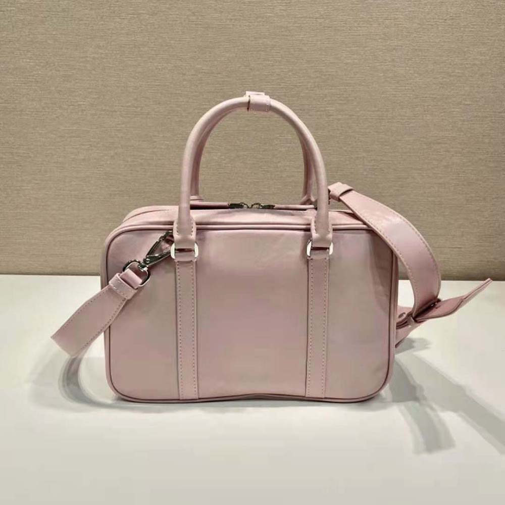 Side angle showing pink antique nappa leather texture on Prada Women Medium Antique Nappa Leather Top Handle Bag-Pink