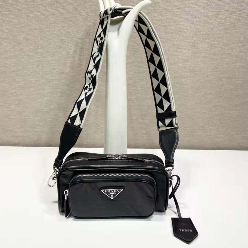 Close-up of gold-tone hardware on Prada Women Nappa Antique Leather Bag