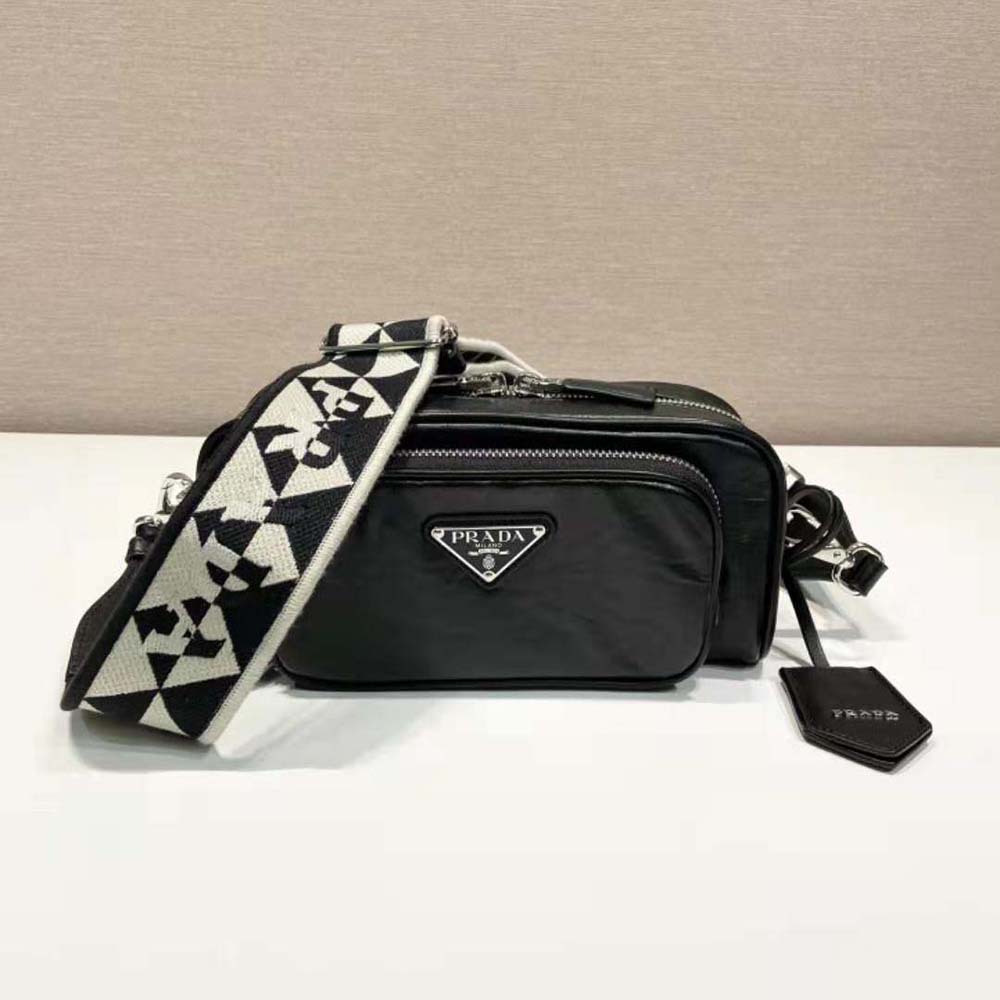 Side angle showing multiple pockets of Prada Women Nappa Antique Leather Shoulder Bag
