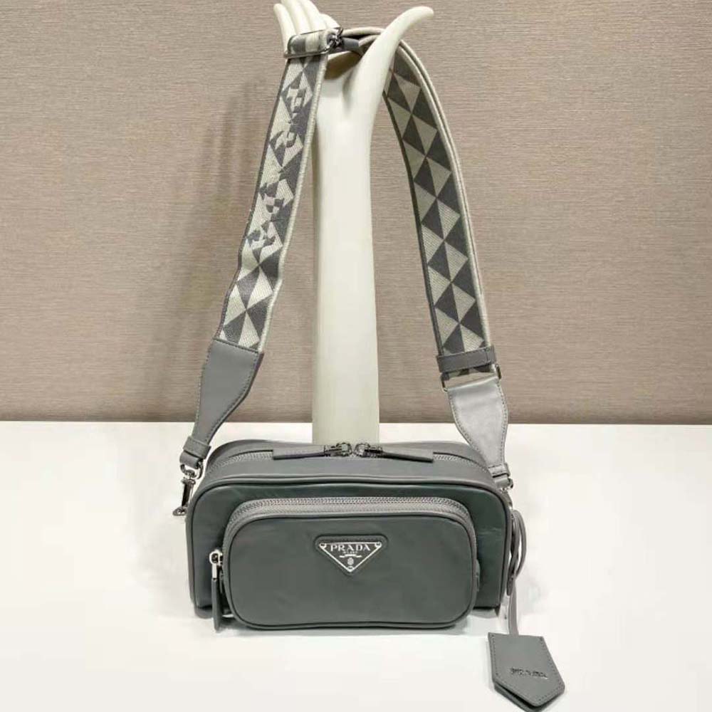 Close-up of gray nappa leather texture and gunmetal hardware detail