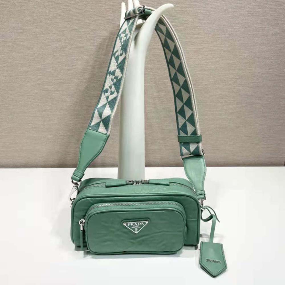 Close-up of gold-tone hardware on Prada Women Nappa Antique Leather Multi-Pocket Shoulder Bag-Green