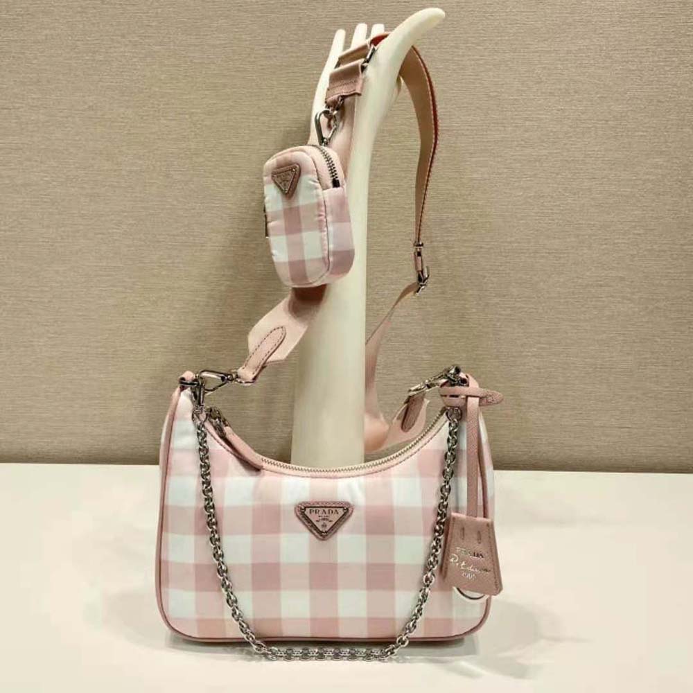 Close-up of pink printed fabric and silver hardware on the Prada bag