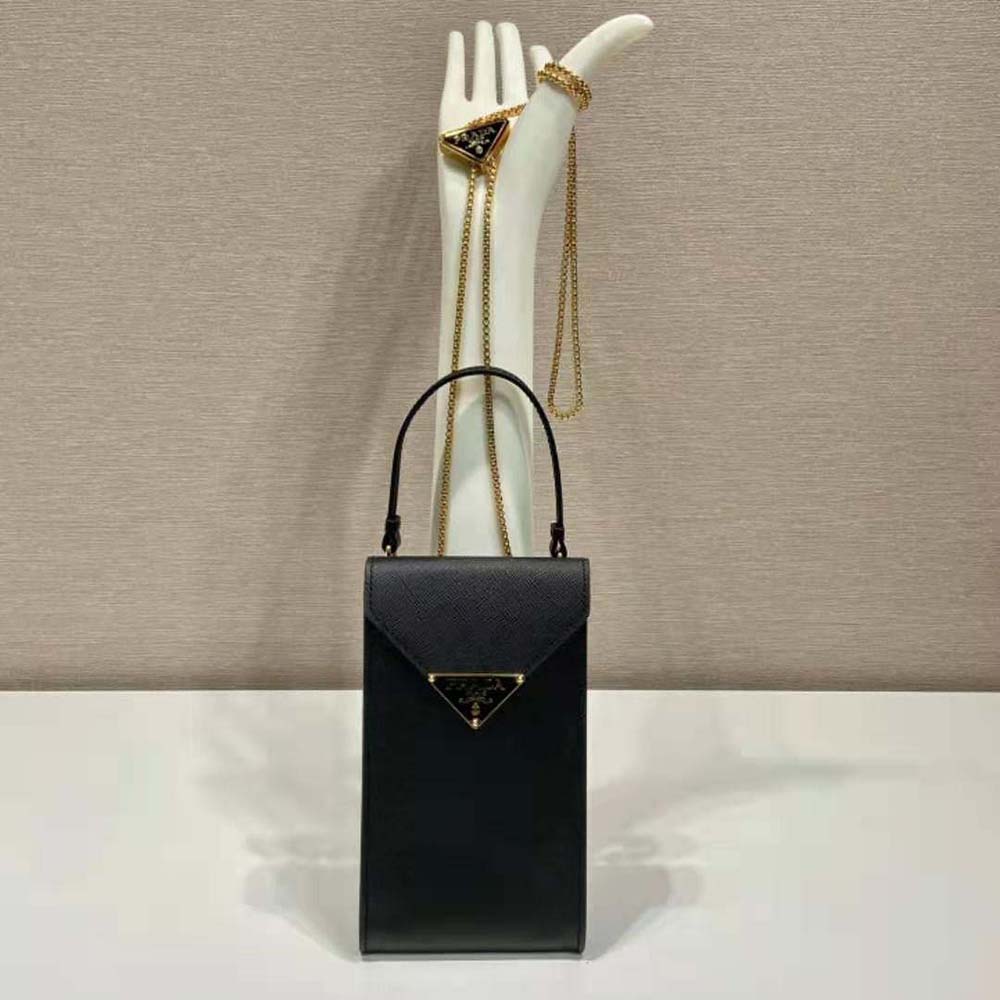 Side angle showing adjustable strap on Prada Women Saffiano Leather Mini-Bag-Black