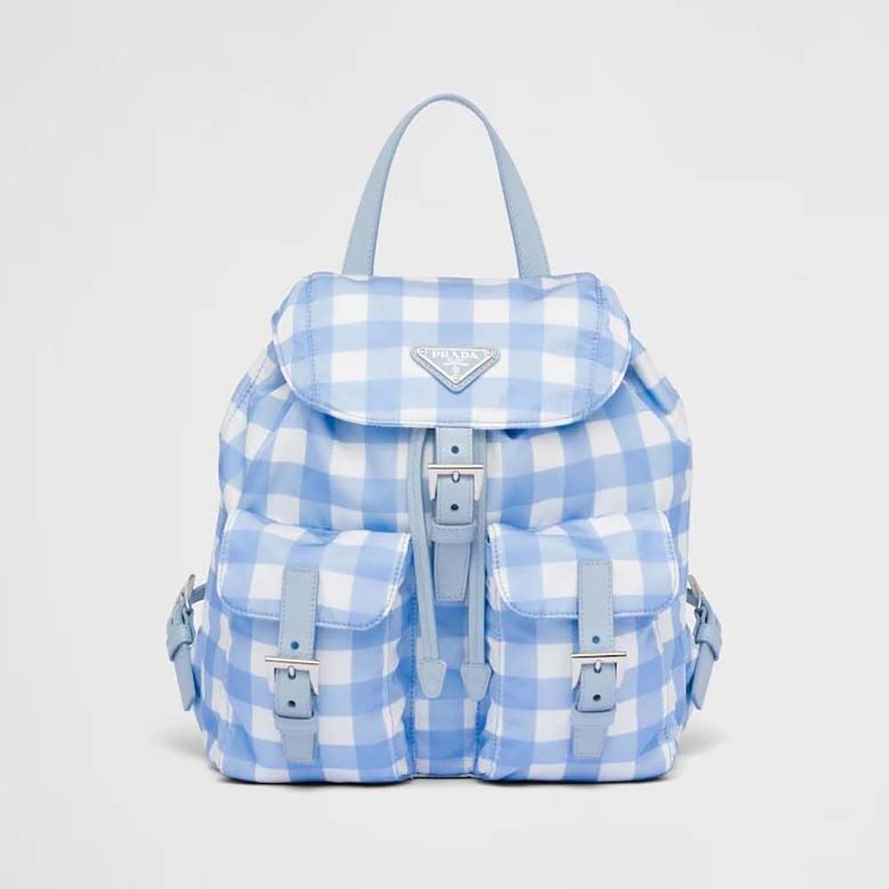 Front view of Prada Women Small Printed Re-Nylon Backpack-Blue with zipper closed