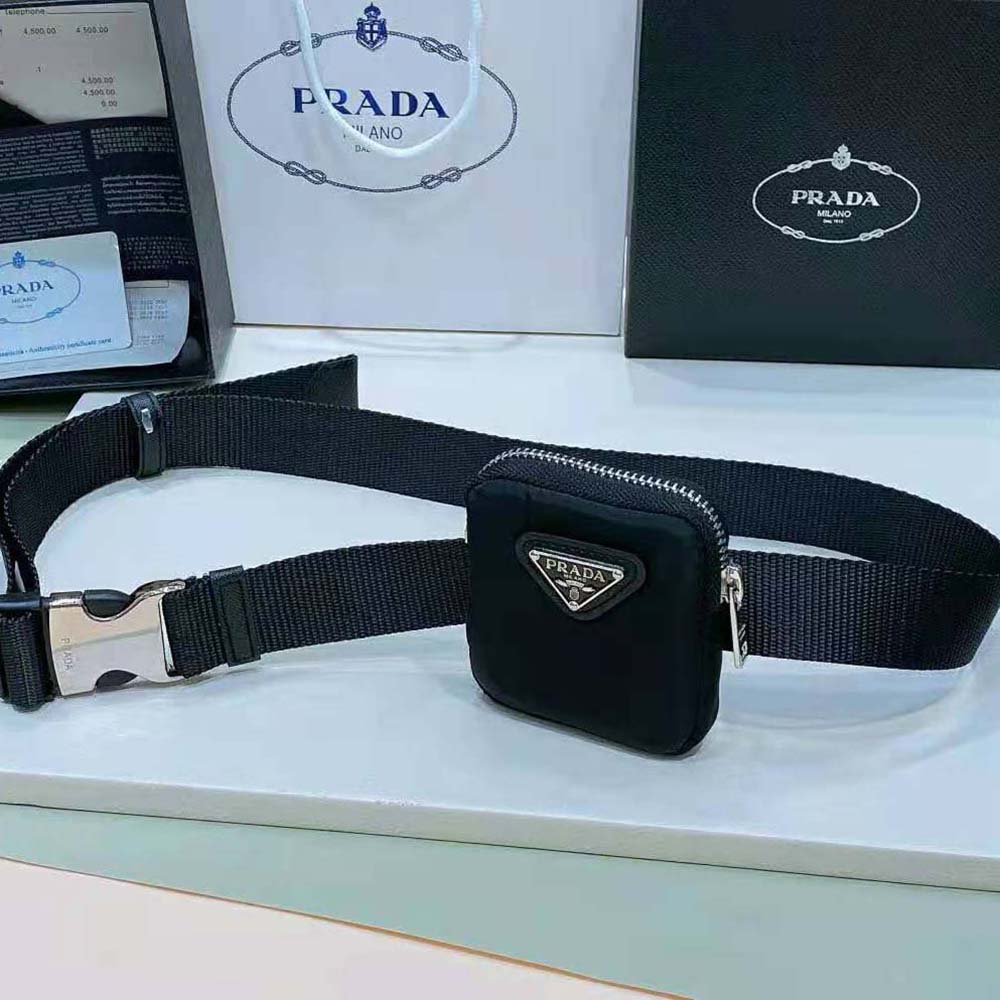 Close-up of enameled metal triangle logo on Prada Women Woven Nylon Belt