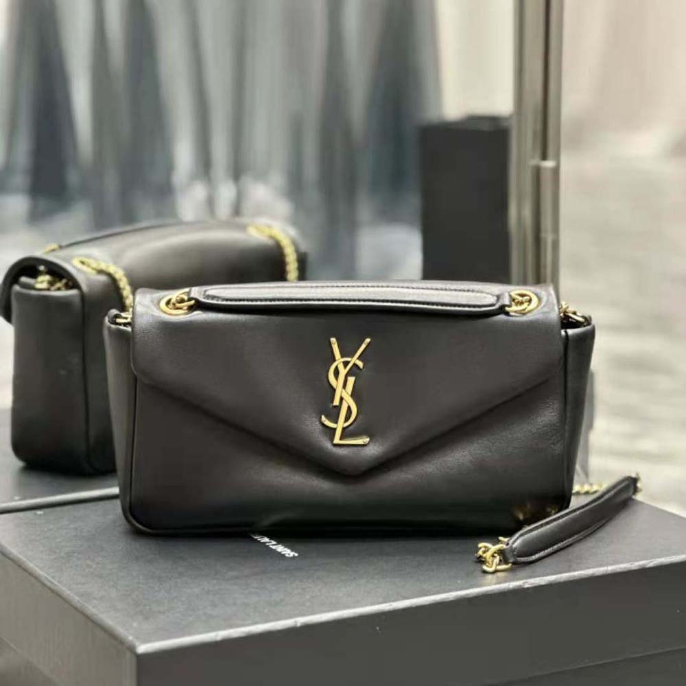 Close-up of gold YSL logo hardware on Calypso lambskin shoulder bag