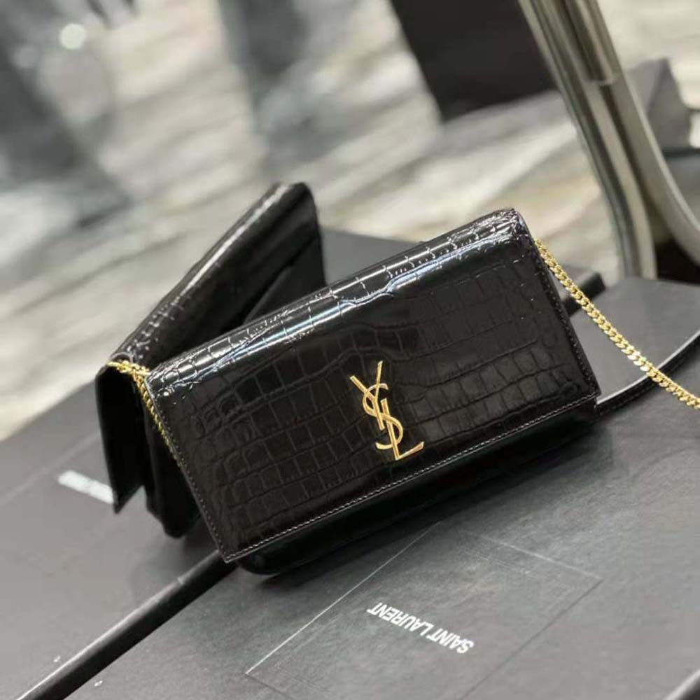 Side angle showing adjustable strap and compact silhouette of Saint Laurent YSL phone holder