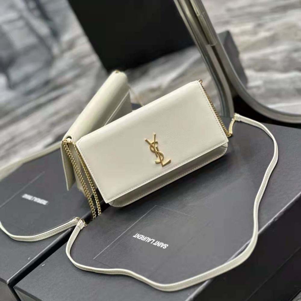 Side angle showing adjustable strap on Saint Laurent white phone holder