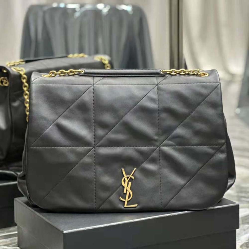 Close-up of gold YSL logo hardware on Saint Laurent YSL Women Jamie 4.3
