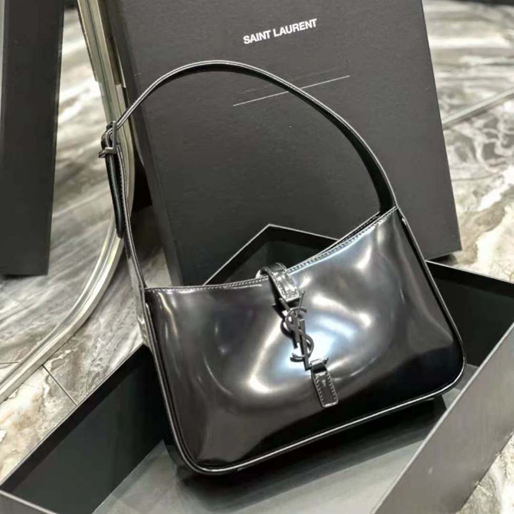 Side profile showing adjustable shoulder strap of Saint Laurent YSL bag