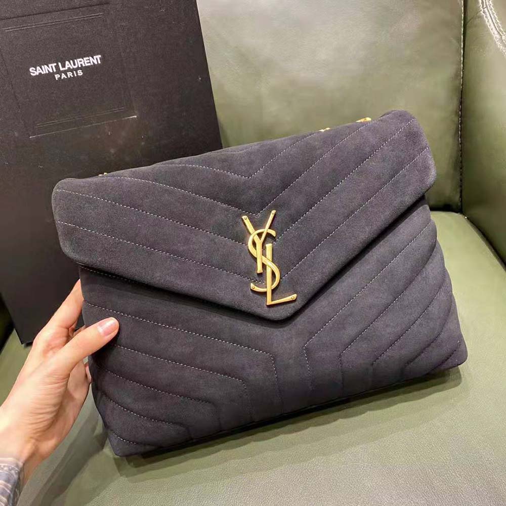Close-up of Y-quilted pattern and gold chain on Saint Laurent YSL bag