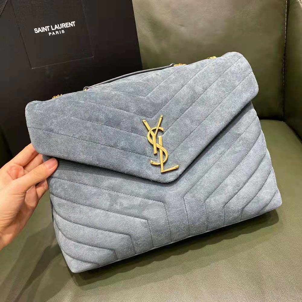 Close-up of silver chain and Y-quilted detail on Saint Laurent YSL bag