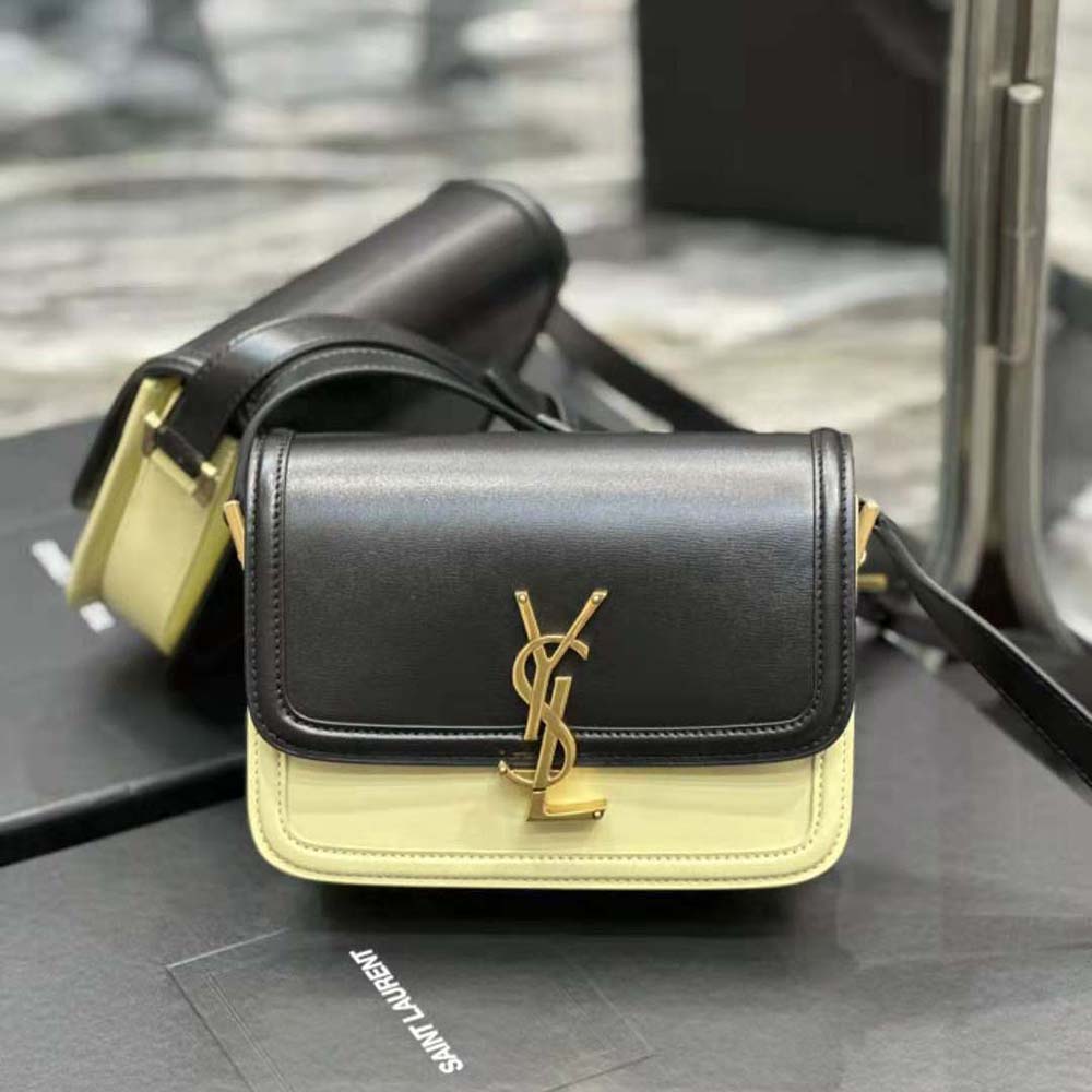 Close-up of gold YSL logo hardware on Saint Laurent Solferino satchel