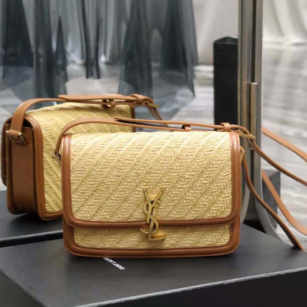 Close-up of gold-tone YSL hardware on Solferino Medium Satchel shoulder bag