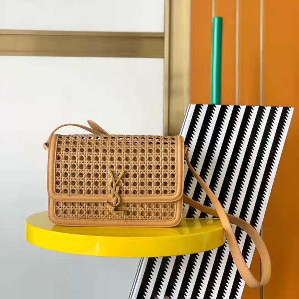 Close-up of gold YSL hardware on Solferino Medium leather bag
