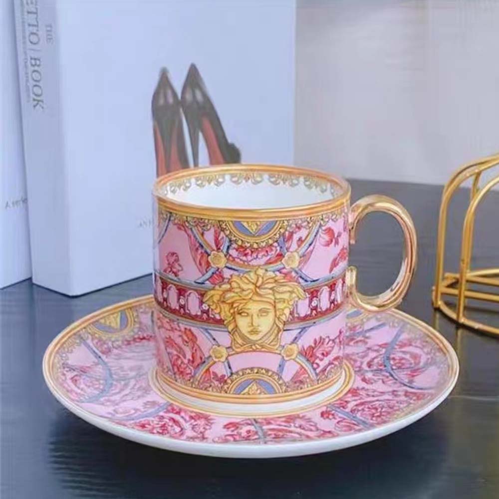 Close-up of cup handle and gold Scala Del Palazzo detail on coffee set