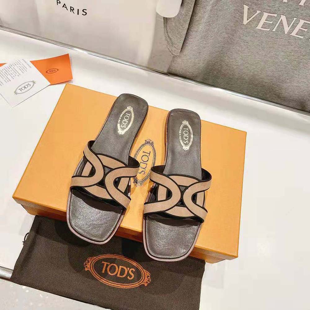 Close-up detail of signature pebble hardware on TODS Women Sandals