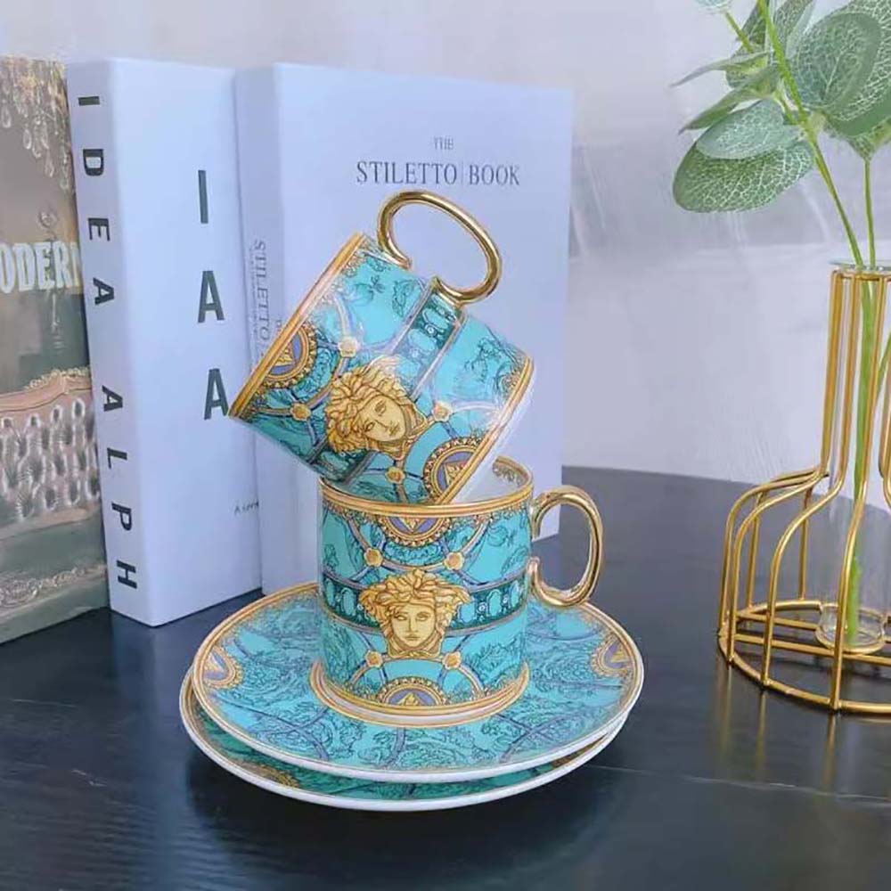Side angle showing handle detail on Versace Scala Del Palazzo coffee cup