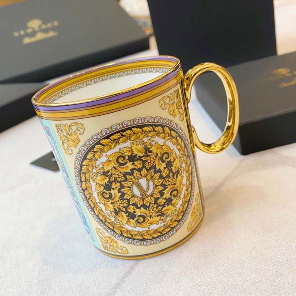 Side angle highlighting handle and glossy finish of Versace Barocco Mosaic Mug