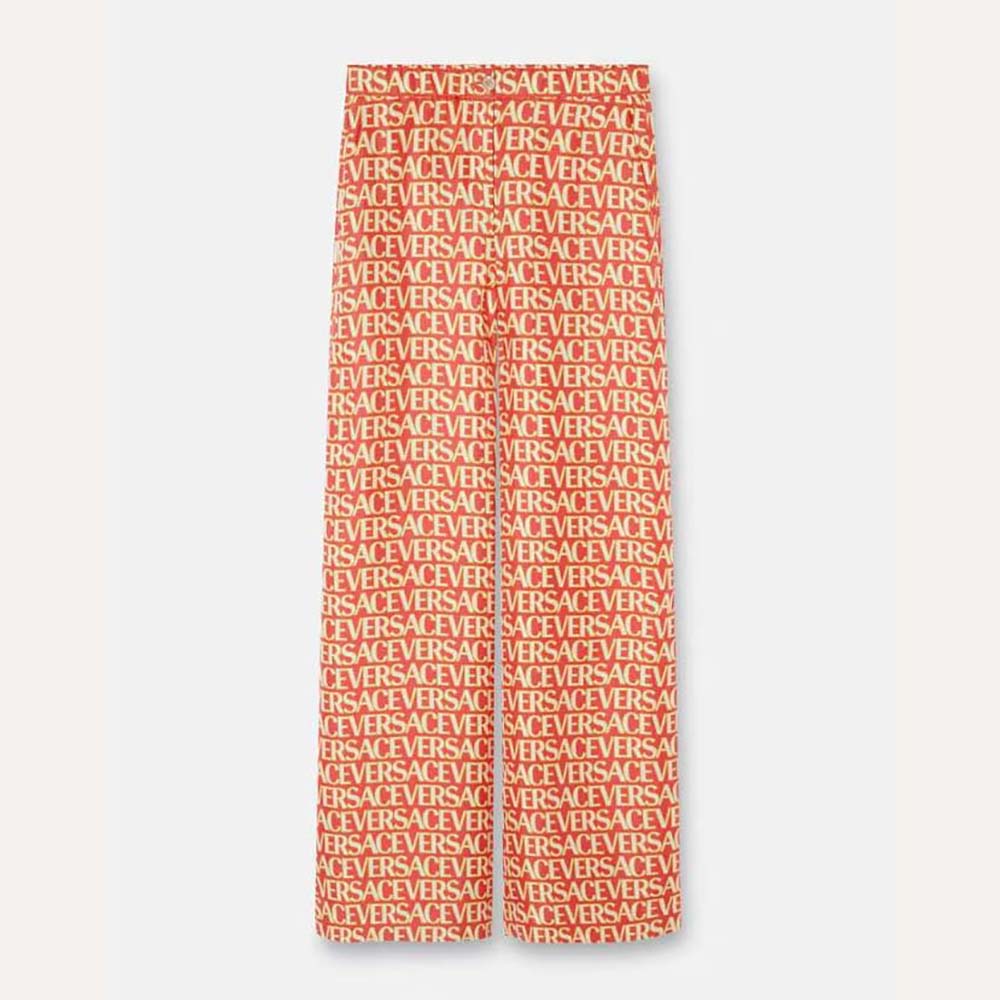 Front view of Versace Women Allover Silk Pants in vibrant pink