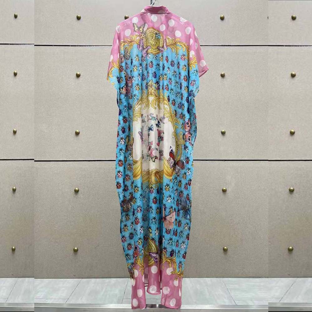 Side angle showing flowy silhouette of Versace Women Butterflies Shirt Cover-up