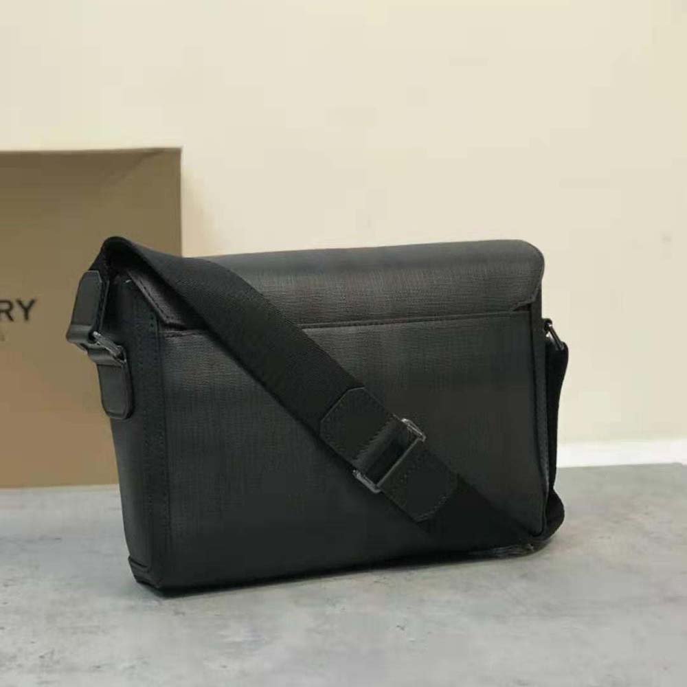 Side profile showing structured shape of Burberry Men Large Wright Bag